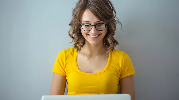 White lady on a laptop